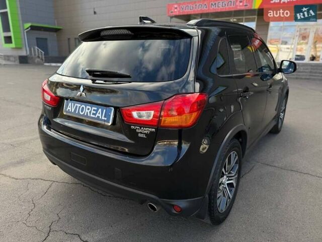 Черный Мицубиси Outlander Sport, объемом двигателя 2.4 л и пробегом 230 тыс. км за 14200 $, фото 22 на Automoto.ua