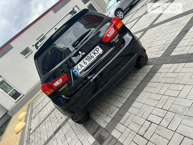 Черный Мицубиси Outlander Sport, объемом двигателя 2.4 л и пробегом 107 тыс. км за 11650 $, фото 10 на Automoto.ua