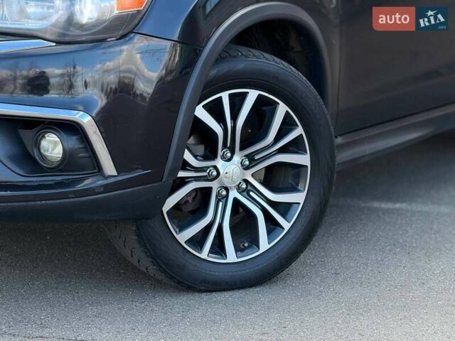 Черный Мицубиси Outlander Sport, объемом двигателя 2.4 л и пробегом 230 тыс. км за 14200 $, фото 6 на Automoto.ua