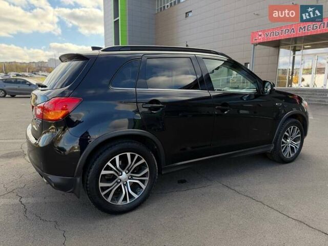 Черный Мицубиси Outlander Sport, объемом двигателя 2.4 л и пробегом 230 тыс. км за 14200 $, фото 21 на Automoto.ua