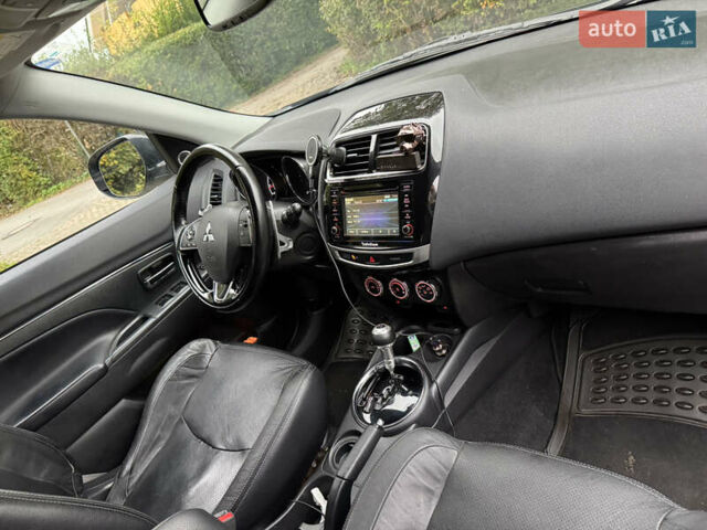 Черный Мицубиси Outlander Sport, объемом двигателя 2.4 л и пробегом 140 тыс. км за 11000 $, фото 10 на Automoto.ua