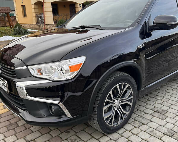 Черный Мицубиси Outlander Sport, объемом двигателя 2 л и пробегом 67 тыс. км за 14250 $, фото 1 на Automoto.ua