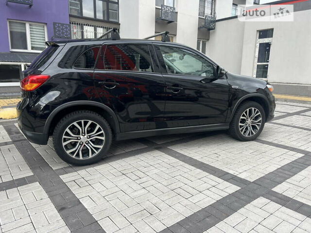 Черный Мицубиси Outlander Sport, объемом двигателя 2.4 л и пробегом 107 тыс. км за 11650 $, фото 14 на Automoto.ua