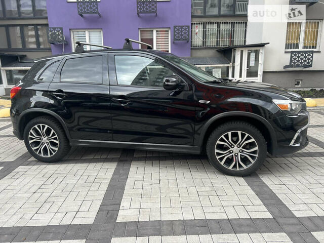 Черный Мицубиси Outlander Sport, объемом двигателя 2.4 л и пробегом 107 тыс. км за 11650 $, фото 12 на Automoto.ua