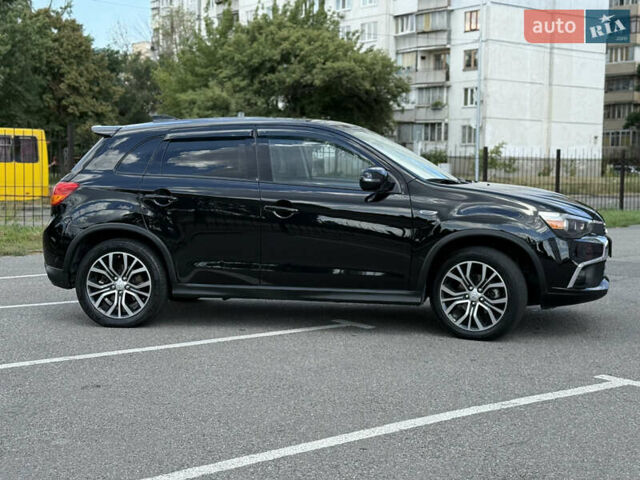 Черный Мицубиси Outlander Sport, объемом двигателя 2 л и пробегом 90 тыс. км за 11900 $, фото 4 на Automoto.ua
