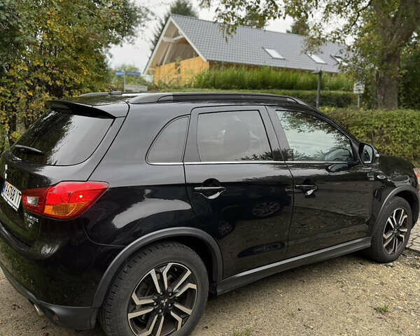 Черный Мицубиси Outlander Sport, объемом двигателя 2.4 л и пробегом 140 тыс. км за 11000 $, фото 3 на Automoto.ua
