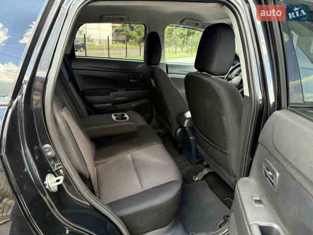 Черный Мицубиси Outlander Sport, объемом двигателя 2 л и пробегом 90 тыс. км за 11900 $, фото 20 на Automoto.ua