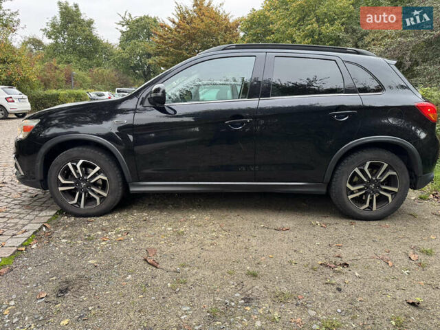 Черный Мицубиси Outlander Sport, объемом двигателя 2.4 л и пробегом 140 тыс. км за 11000 $, фото 6 на Automoto.ua