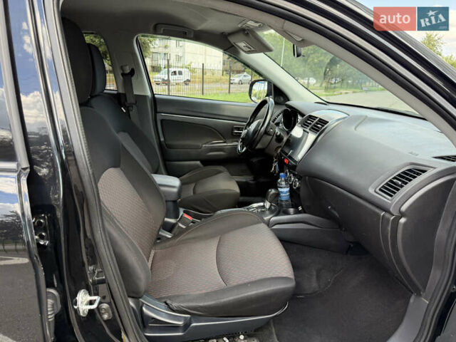 Черный Мицубиси Outlander Sport, объемом двигателя 2 л и пробегом 90 тыс. км за 11900 $, фото 14 на Automoto.ua