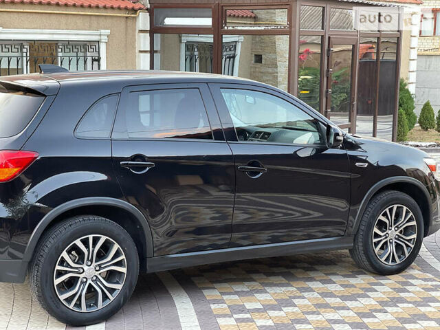 Чорний Міцубісі Outlander Sport, об'ємом двигуна 2 л та пробігом 71 тис. км за 14500 $, фото 4 на Automoto.ua