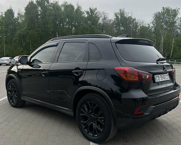 Чорний Міцубісі Outlander Sport, об'ємом двигуна 2 л та пробігом 79 тис. км за 12500 $, фото 8 на Automoto.ua