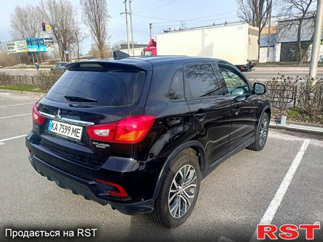 Черный Мицубиси Outlander Sport, объемом двигателя 2 л и пробегом 71 тыс. км за 15000 $, фото 3 на Automoto.ua