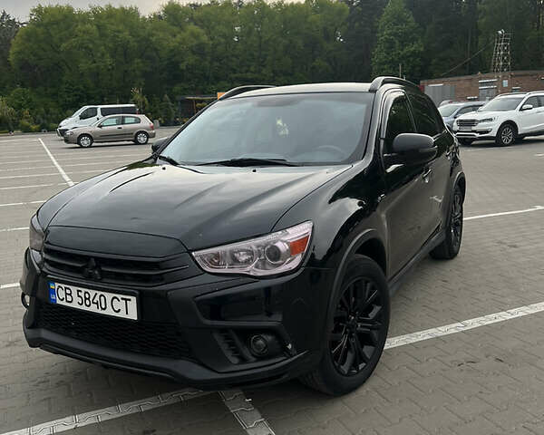 Черный Мицубиси Outlander Sport, объемом двигателя 2 л и пробегом 79 тыс. км за 12500 $, фото 3 на Automoto.ua