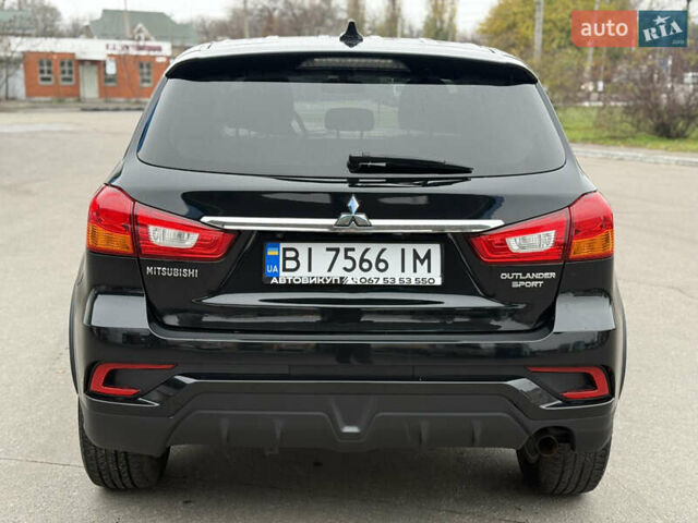 Черный Мицубиси Outlander Sport, объемом двигателя 2 л и пробегом 101 тыс. км за 14300 $, фото 4 на Automoto.ua
