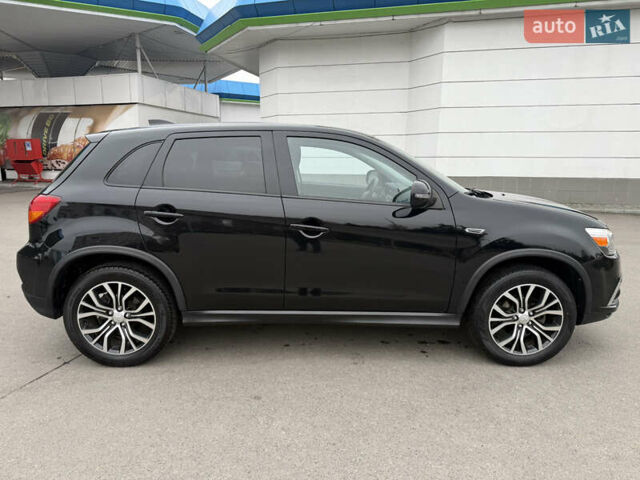 Черный Мицубиси Outlander Sport, объемом двигателя 2 л и пробегом 101 тыс. км за 14300 $, фото 2 на Automoto.ua