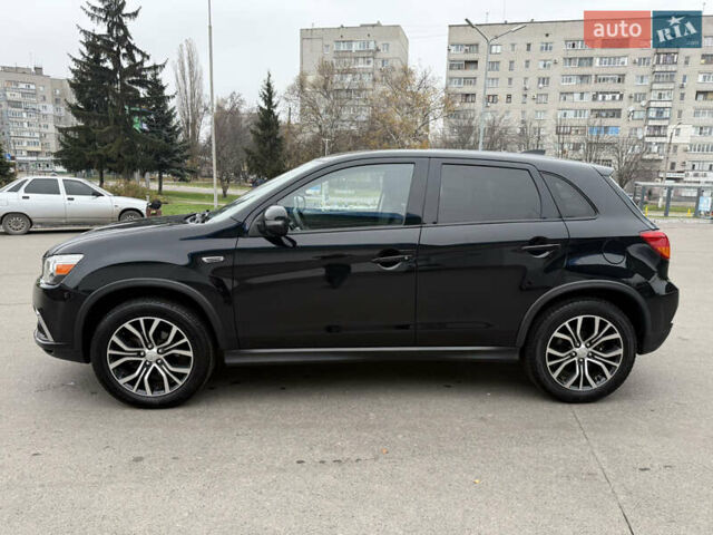 Черный Мицубиси Outlander Sport, объемом двигателя 2 л и пробегом 101 тыс. км за 14300 $, фото 6 на Automoto.ua