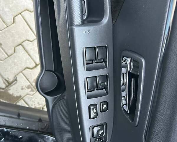 Черный Мицубиси Outlander Sport, объемом двигателя 2 л и пробегом 147 тыс. км за 19200 $, фото 16 на Automoto.ua
