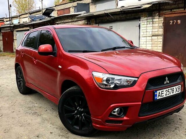 Красный Мицубиси Outlander Sport, объемом двигателя 2 л и пробегом 250 тыс. км за 10500 $, фото 4 на Automoto.ua