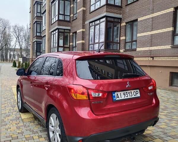 Красный Мицубиси Outlander Sport, объемом двигателя 2 л и пробегом 203 тыс. км за 9250 $, фото 7 на Automoto.ua