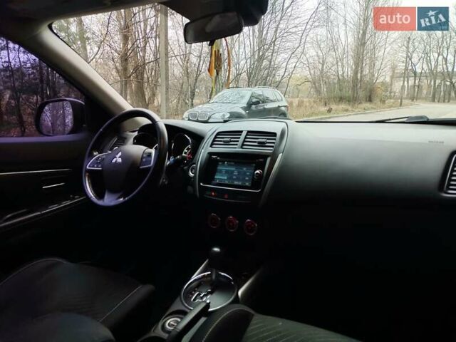 Красный Мицубиси Outlander Sport, объемом двигателя 2 л и пробегом 203 тыс. км за 9250 $, фото 9 на Automoto.ua