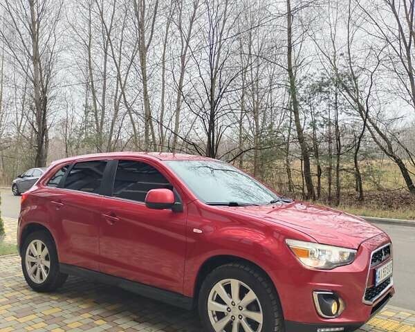 Красный Мицубиси Outlander Sport, объемом двигателя 2 л и пробегом 203 тыс. км за 9250 $, фото 3 на Automoto.ua