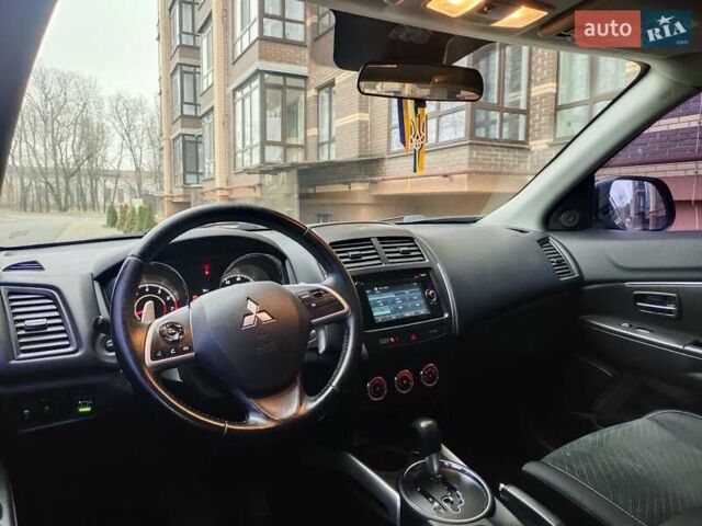 Красный Мицубиси Outlander Sport, объемом двигателя 2 л и пробегом 203 тыс. км за 9250 $, фото 10 на Automoto.ua