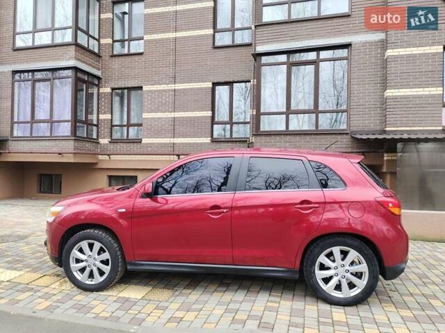 Красный Мицубиси Outlander Sport, объемом двигателя 2 л и пробегом 203 тыс. км за 9250 $, фото 8 на Automoto.ua