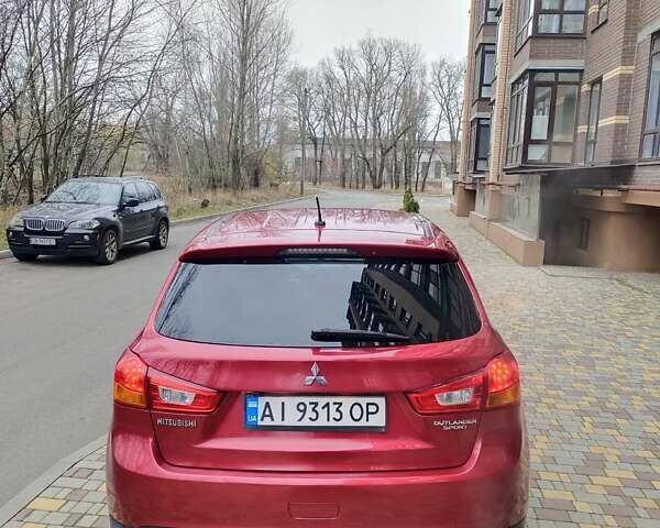 Красный Мицубиси Outlander Sport, объемом двигателя 2 л и пробегом 203 тыс. км за 9250 $, фото 6 на Automoto.ua