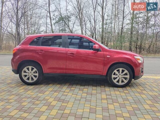 Красный Мицубиси Outlander Sport, объемом двигателя 2 л и пробегом 203 тыс. км за 9250 $, фото 4 на Automoto.ua