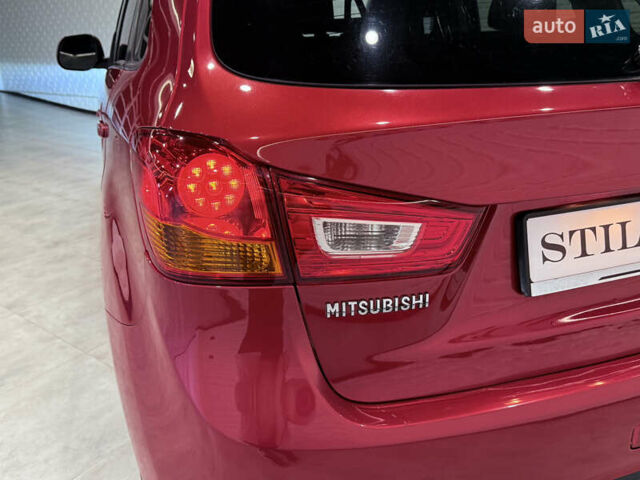 Красный Мицубиси Outlander Sport, объемом двигателя 2 л и пробегом 99 тыс. км за 11999 $, фото 51 на Automoto.ua
