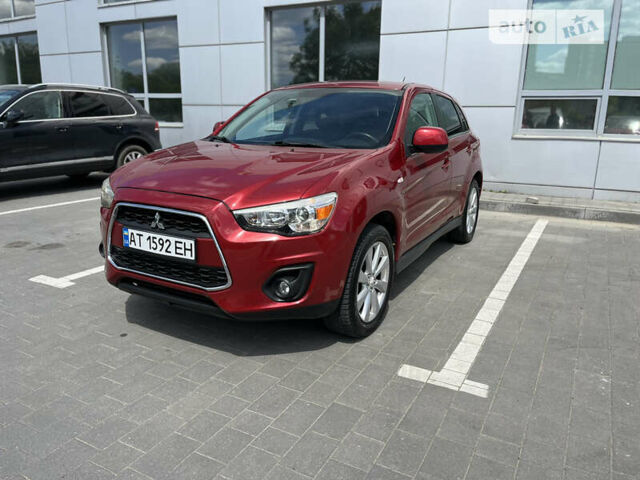 Красный Мицубиси Outlander Sport, объемом двигателя 2 л и пробегом 228 тыс. км за 11300 $, фото 1 на Automoto.ua