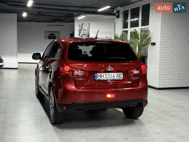 Красный Мицубиси Outlander Sport, объемом двигателя 2 л и пробегом 99 тыс. км за 11999 $, фото 19 на Automoto.ua