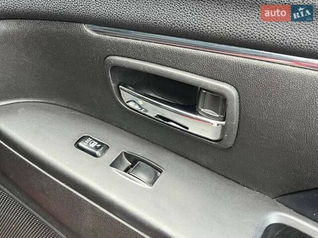 Красный Мицубиси Outlander Sport, объемом двигателя 2 л и пробегом 220 тыс. км за 10500 $, фото 5 на Automoto.ua