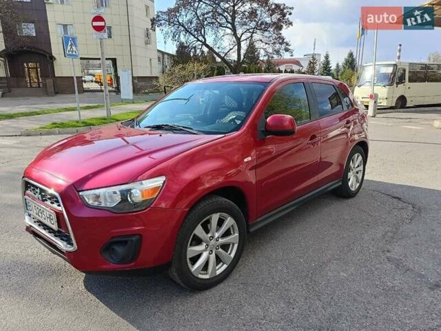 Красный Мицубиси Outlander Sport, объемом двигателя 2 л и пробегом 220 тыс. км за 11500 $, фото 3 на Automoto.ua