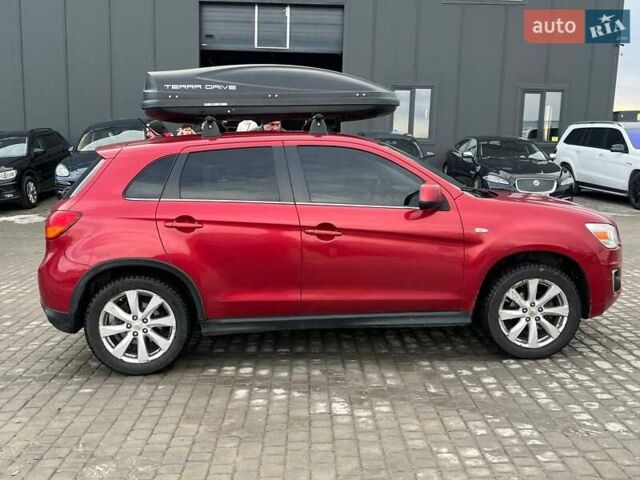Красный Мицубиси Outlander Sport, объемом двигателя 2 л и пробегом 220 тыс. км за 10500 $, фото 18 на Automoto.ua