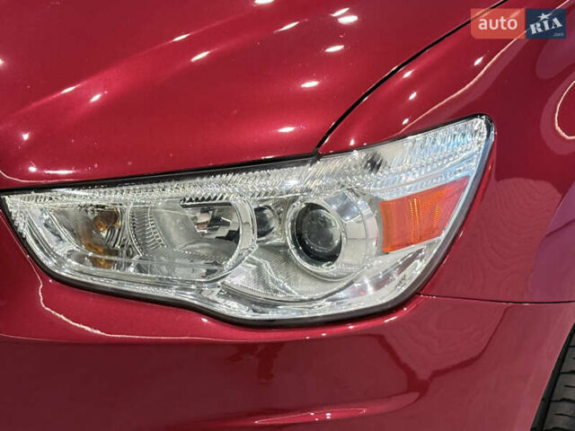 Красный Мицубиси Outlander Sport, объемом двигателя 2 л и пробегом 99 тыс. км за 11999 $, фото 7 на Automoto.ua