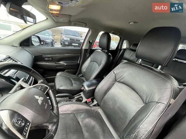 Красный Мицубиси Outlander Sport, объемом двигателя 2 л и пробегом 220 тыс. км за 10500 $, фото 11 на Automoto.ua