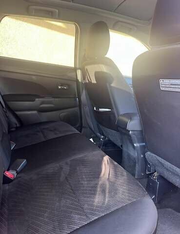 Красный Мицубиси Outlander Sport, объемом двигателя 2 л и пробегом 172 тыс. км за 12500 $, фото 8 на Automoto.ua