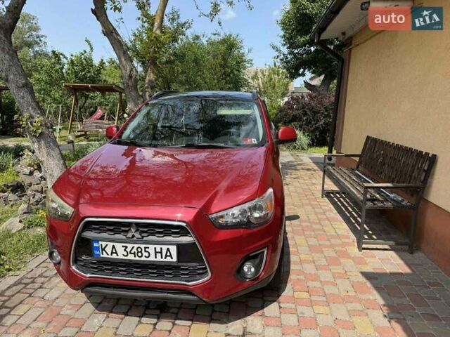 Красный Мицубиси Outlander Sport, объемом двигателя 2 л и пробегом 172 тыс. км за 12500 $, фото 4 на Automoto.ua