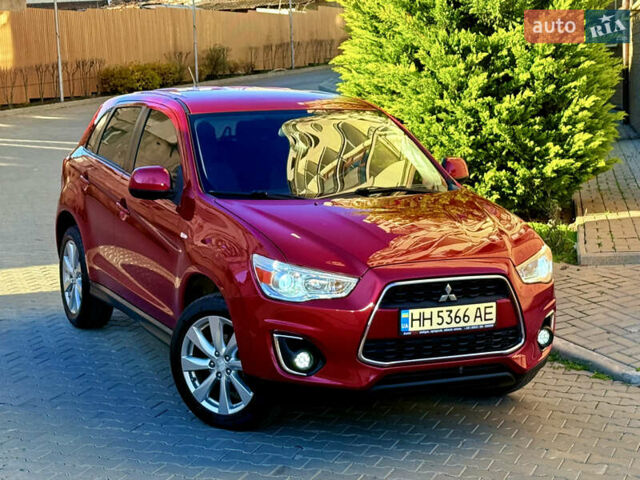Красный Мицубиси Outlander Sport, объемом двигателя 2 л и пробегом 99 тыс. км за 11999 $, фото 3 на Automoto.ua
