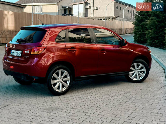 Красный Мицубиси Outlander Sport, объемом двигателя 2 л и пробегом 99 тыс. км за 11999 $, фото 57 на Automoto.ua