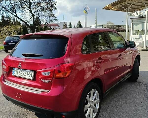 Красный Мицубиси Outlander Sport, объемом двигателя 2 л и пробегом 220 тыс. км за 11500 $, фото 8 на Automoto.ua