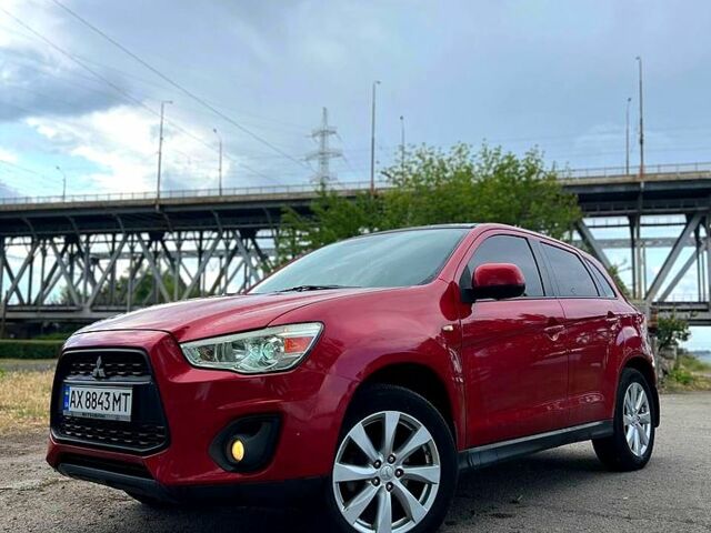Красный Мицубиси Outlander Sport, объемом двигателя 2 л и пробегом 174 тыс. км за 10700 $, фото 5 на Automoto.ua