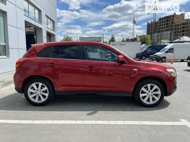 Красный Мицубиси Outlander Sport, объемом двигателя 2 л и пробегом 228 тыс. км за 11300 $, фото 4 на Automoto.ua