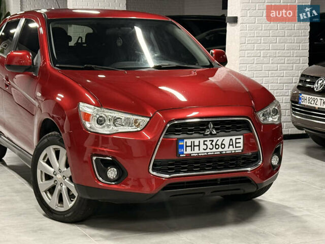 Красный Мицубиси Outlander Sport, объемом двигателя 2 л и пробегом 99 тыс. км за 11999 $, фото 1 на Automoto.ua