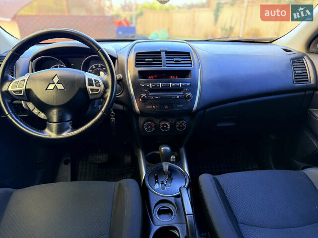 Красный Мицубиси Outlander Sport, объемом двигателя 2 л и пробегом 99 тыс. км за 11999 $, фото 36 на Automoto.ua