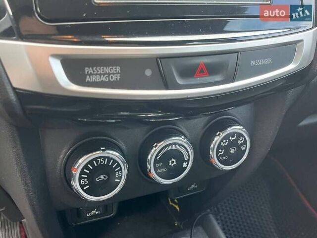 Красный Мицубиси Outlander Sport, объемом двигателя 2 л и пробегом 220 тыс. км за 10500 $, фото 9 на Automoto.ua