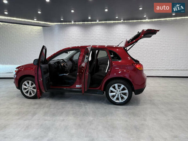 Красный Мицубиси Outlander Sport, объемом двигателя 2 л и пробегом 99 тыс. км за 11999 $, фото 33 на Automoto.ua