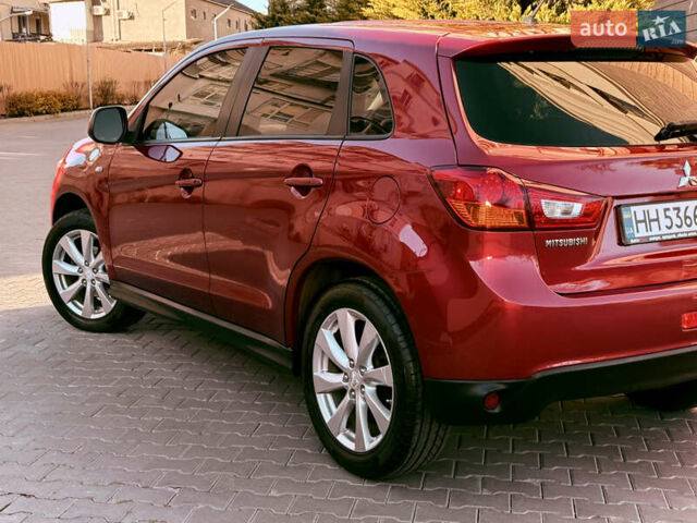 Красный Мицубиси Outlander Sport, объемом двигателя 2 л и пробегом 99 тыс. км за 11999 $, фото 55 на Automoto.ua