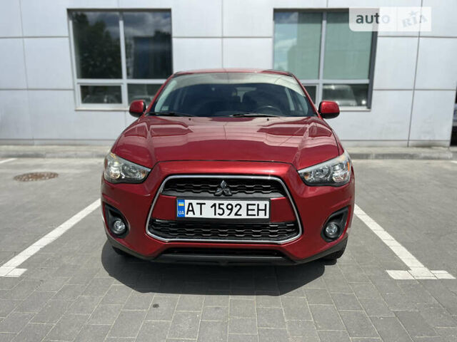 Красный Мицубиси Outlander Sport, объемом двигателя 2 л и пробегом 228 тыс. км за 11300 $, фото 2 на Automoto.ua